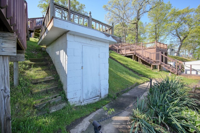 view of shed featuring stairway