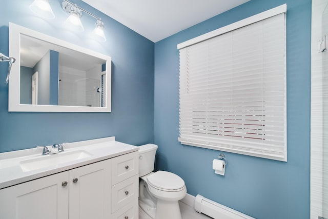 full bathroom featuring toilet, baseboard heating, vanity, baseboards, and walk in shower