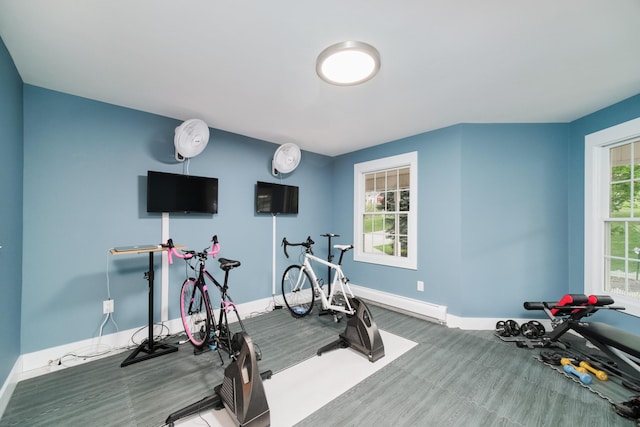 exercise room with baseboards