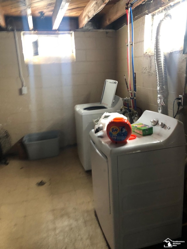 laundry room with washer and dryer and laundry area