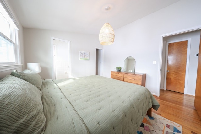 bedroom featuring light wood finished floors