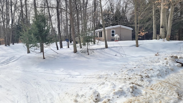 view of yard covered in snow