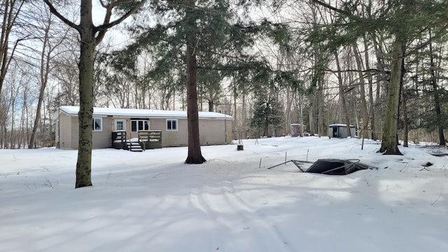 view of yard layered in snow