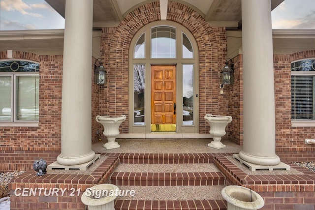 doorway to property featuring a porch