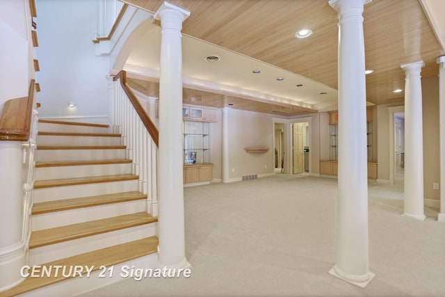 stairway featuring recessed lighting, carpet flooring, visible vents, and ornate columns