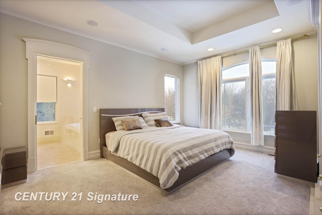 bedroom with carpet floors, multiple windows, and visible vents