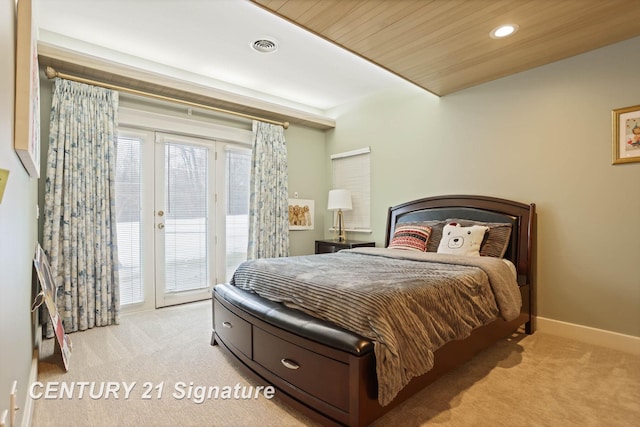 bedroom featuring access to outside, light colored carpet, baseboards, and recessed lighting