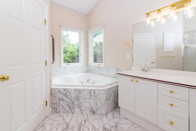 full bath with a shower with shower door, a garden tub, marble finish floor, and vanity