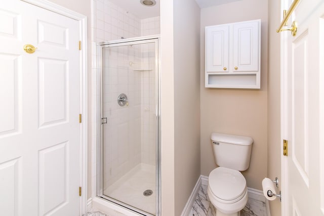 full bathroom featuring marble finish floor, a stall shower, toilet, and baseboards