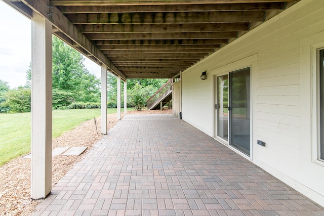 view of patio featuring stairs