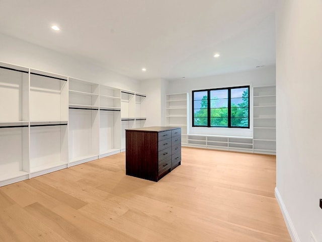 walk in closet featuring light wood-style floors