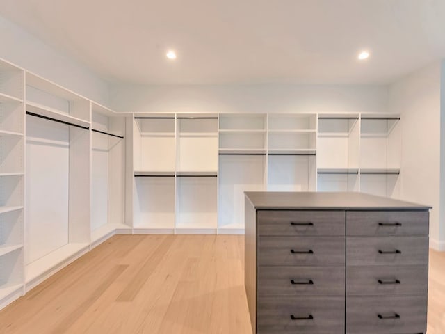 walk in closet featuring light wood-type flooring