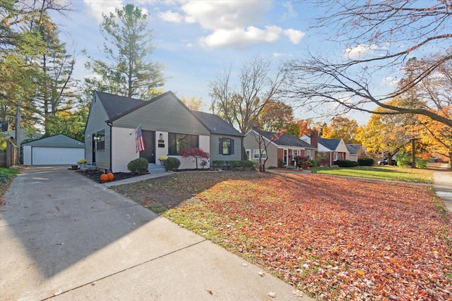 view of front of house with an outbuilding and a garage