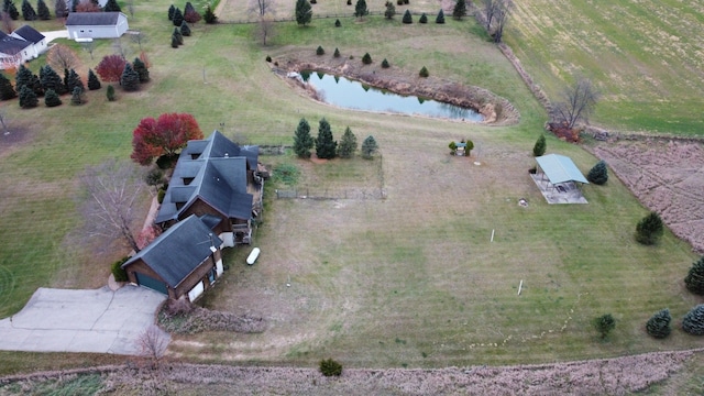 drone / aerial view with a water view and a rural view