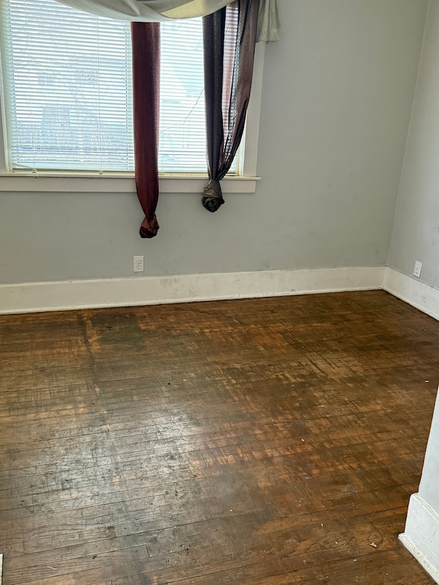 room details with wood finished floors and baseboards