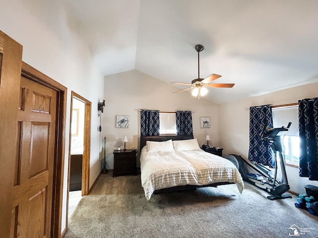 bedroom featuring ceiling fan, vaulted ceiling, and light colored carpet