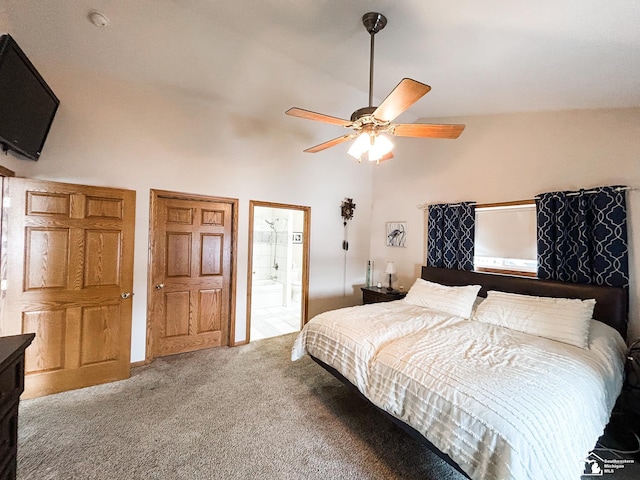 bedroom with high vaulted ceiling, carpet flooring, ceiling fan, and ensuite bathroom