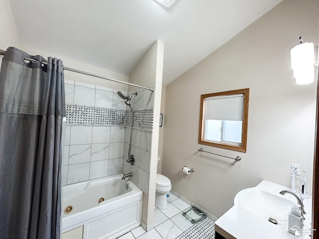 full bath with lofted ceiling, toilet, vanity, baseboards, and shower / bath combo with shower curtain