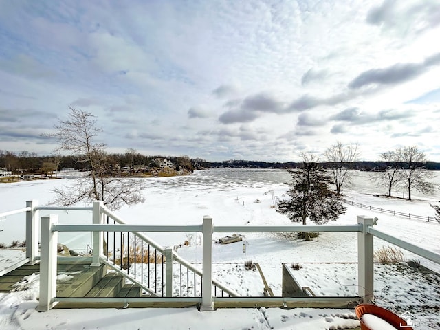 view of snow covered deck