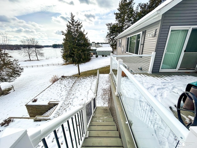 view of snow covered deck