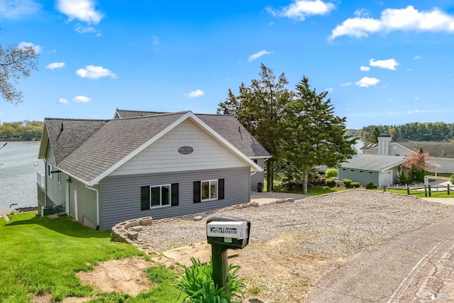 11799 Greenbriar Dr, Jerome, MI 49249 - view of front of house featuring a shingled roof