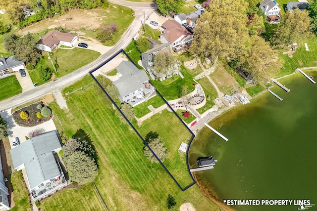 11799 Greenbriar Dr, Jerome, MI 49249 - aerial perspective of suburban area with a nearby body of water