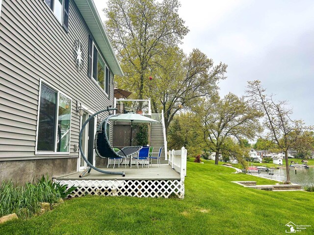 11799 Greenbriar Dr, Jerome, MI 49249 - view of green lawn featuring a deck