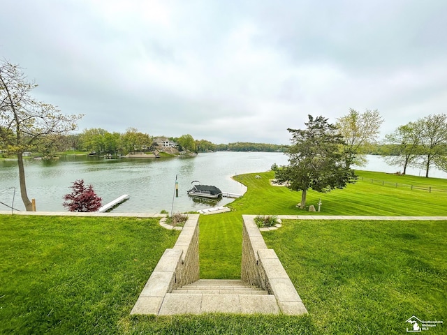 11799 Greenbriar Dr, Jerome, MI 49249 - water view featuring a dock and boat lift