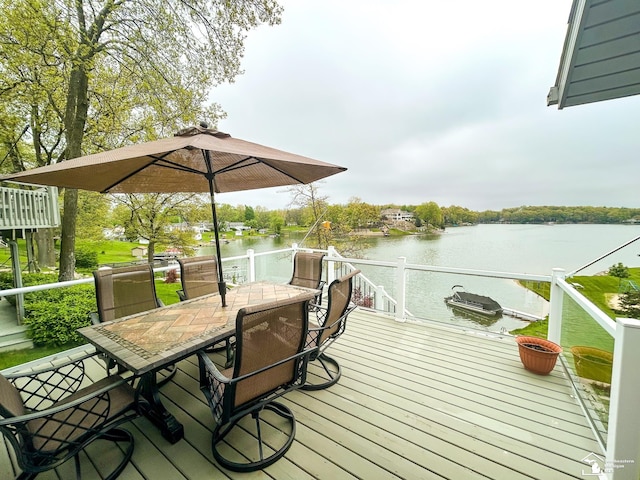 11799 Greenbriar Dr, Jerome, MI 49249 - dock area with outdoor dining area and a deck with water view