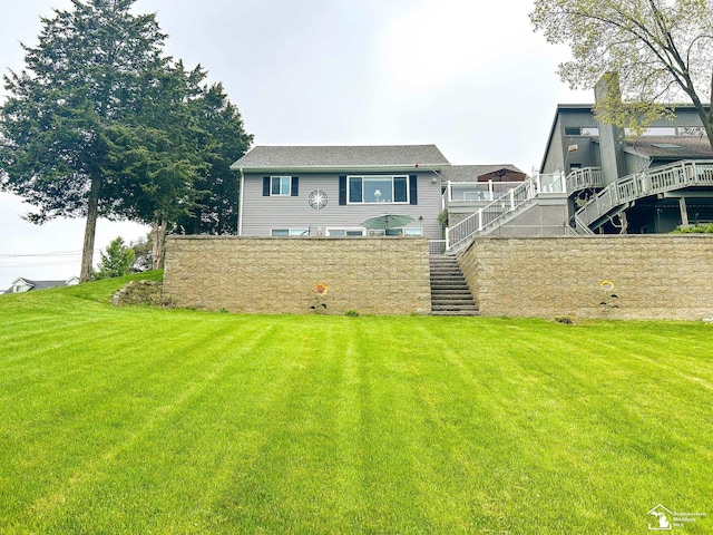 11799 Greenbriar Dr, Jerome, MI 49249 - view of front facade with stairs and a front lawn