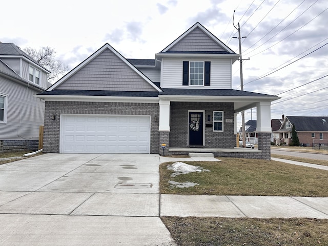 view of front of property featuring brick siding, concrete driveway, covered porch, an attached garage, and a front lawn