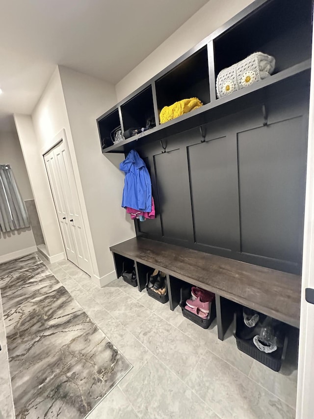 mudroom featuring baseboards