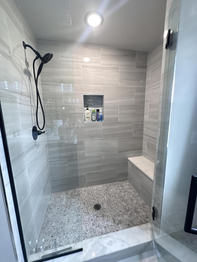 bathroom with a stall shower