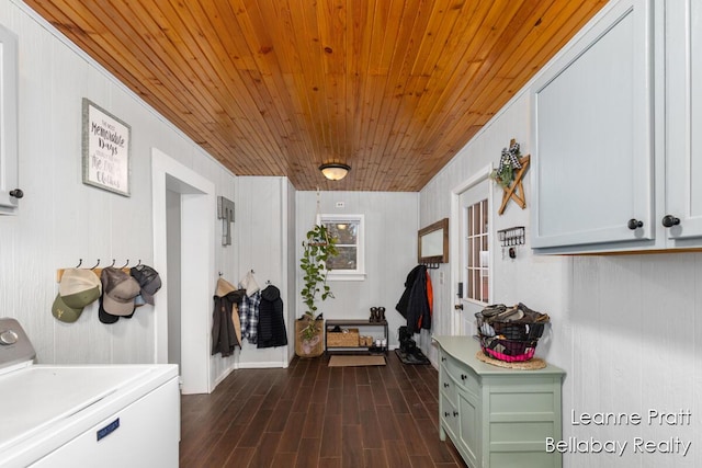 interior space with washer / clothes dryer, dark wood-style flooring, and wooden ceiling