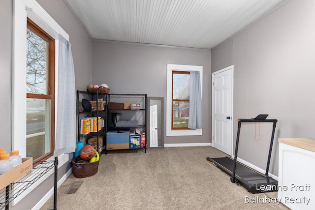 rec room featuring carpet flooring and baseboards