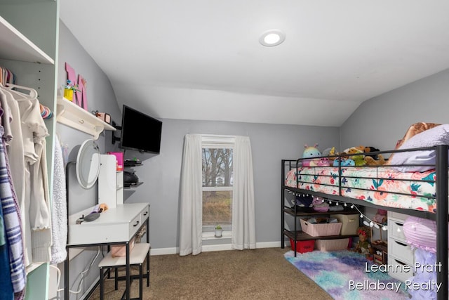 bedroom featuring baseboards, vaulted ceiling, and carpet flooring