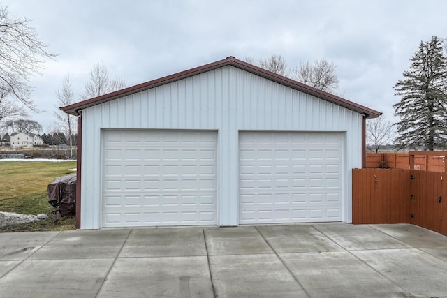 detached garage with fence