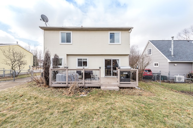 back of house featuring a yard, a fenced backyard, cooling unit, and a wooden deck