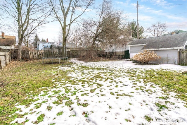 view of yard with a fenced backyard and a trampoline