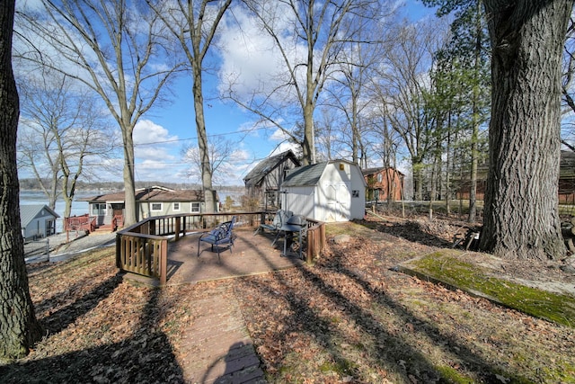 view of yard with a storage unit and an outdoor structure