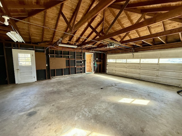 garage featuring a garage door opener