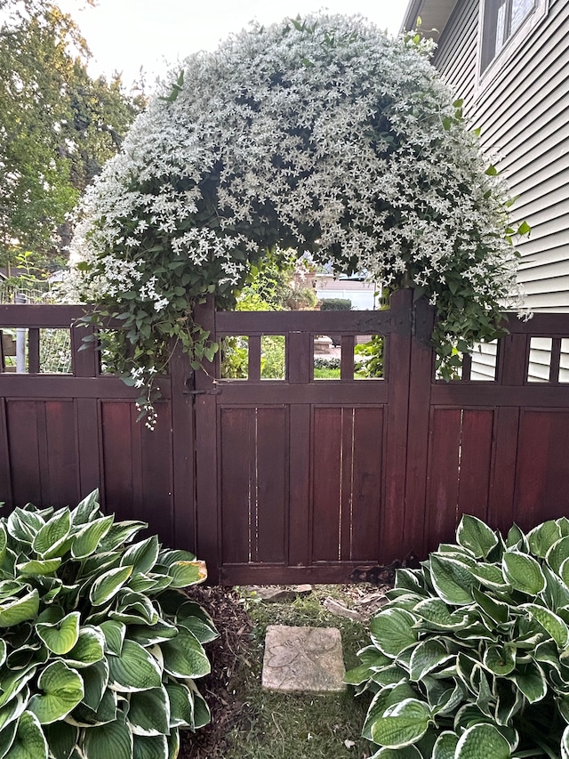 view of gate featuring fence