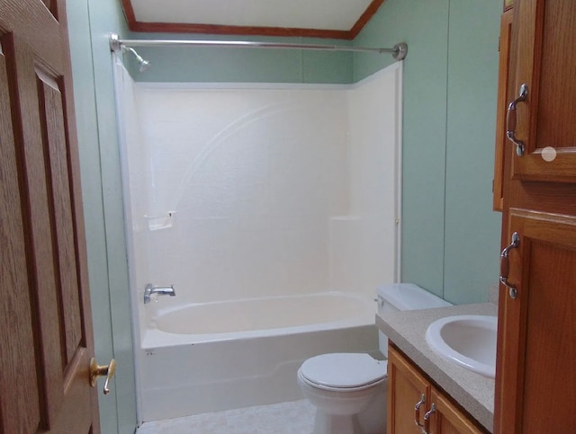 bathroom with ornamental molding, vanity, toilet, and shower / bathtub combination