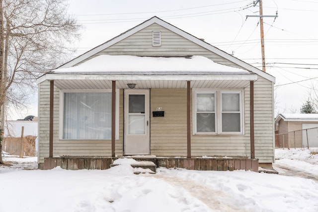 view of front of property featuring covered porch