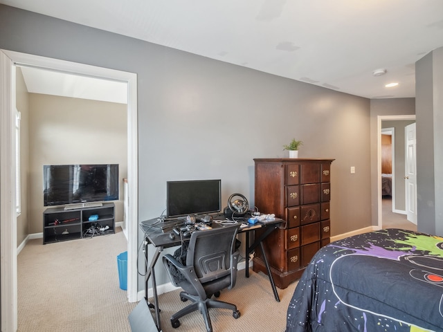 carpeted bedroom with baseboards