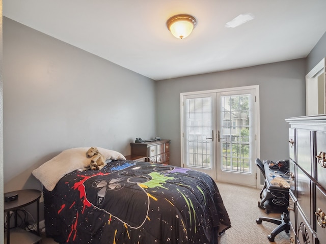 bedroom featuring access to exterior, carpet, and french doors