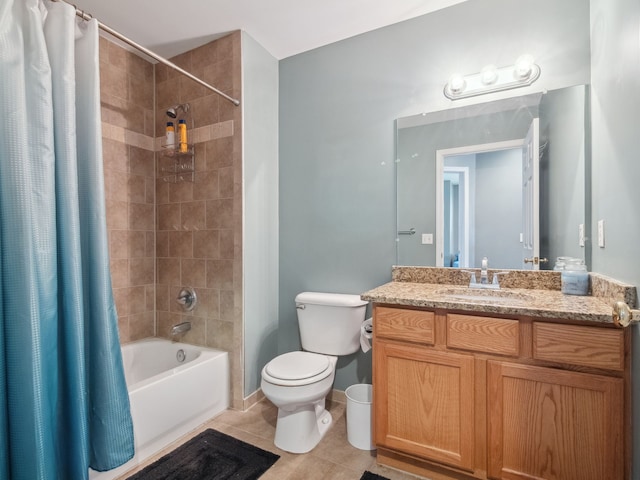 full bath with baseboards, toilet, tile patterned flooring, shower / bath combo with shower curtain, and vanity