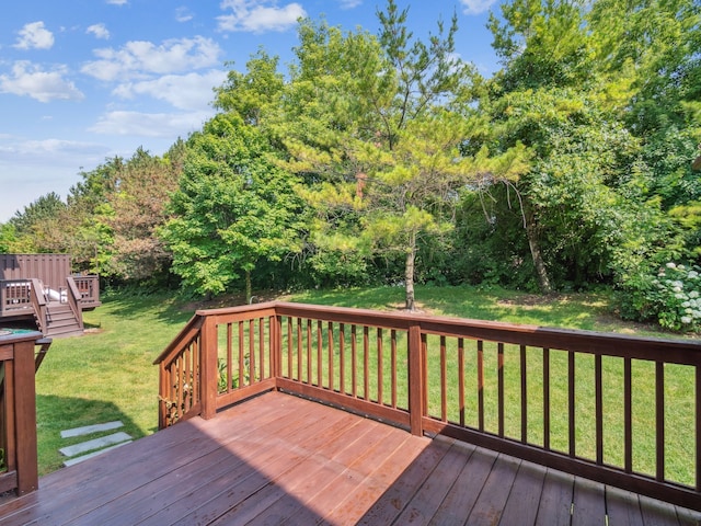 deck featuring a yard