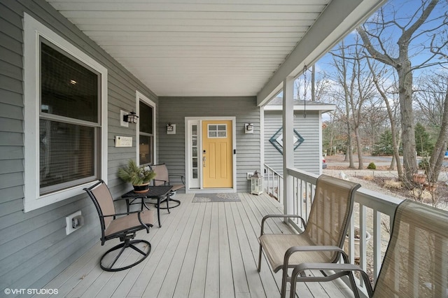 wooden deck featuring a porch