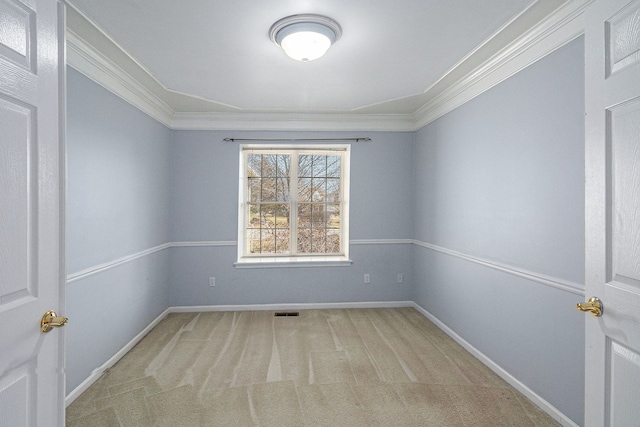 unfurnished room featuring light carpet, baseboards, visible vents, and ornamental molding